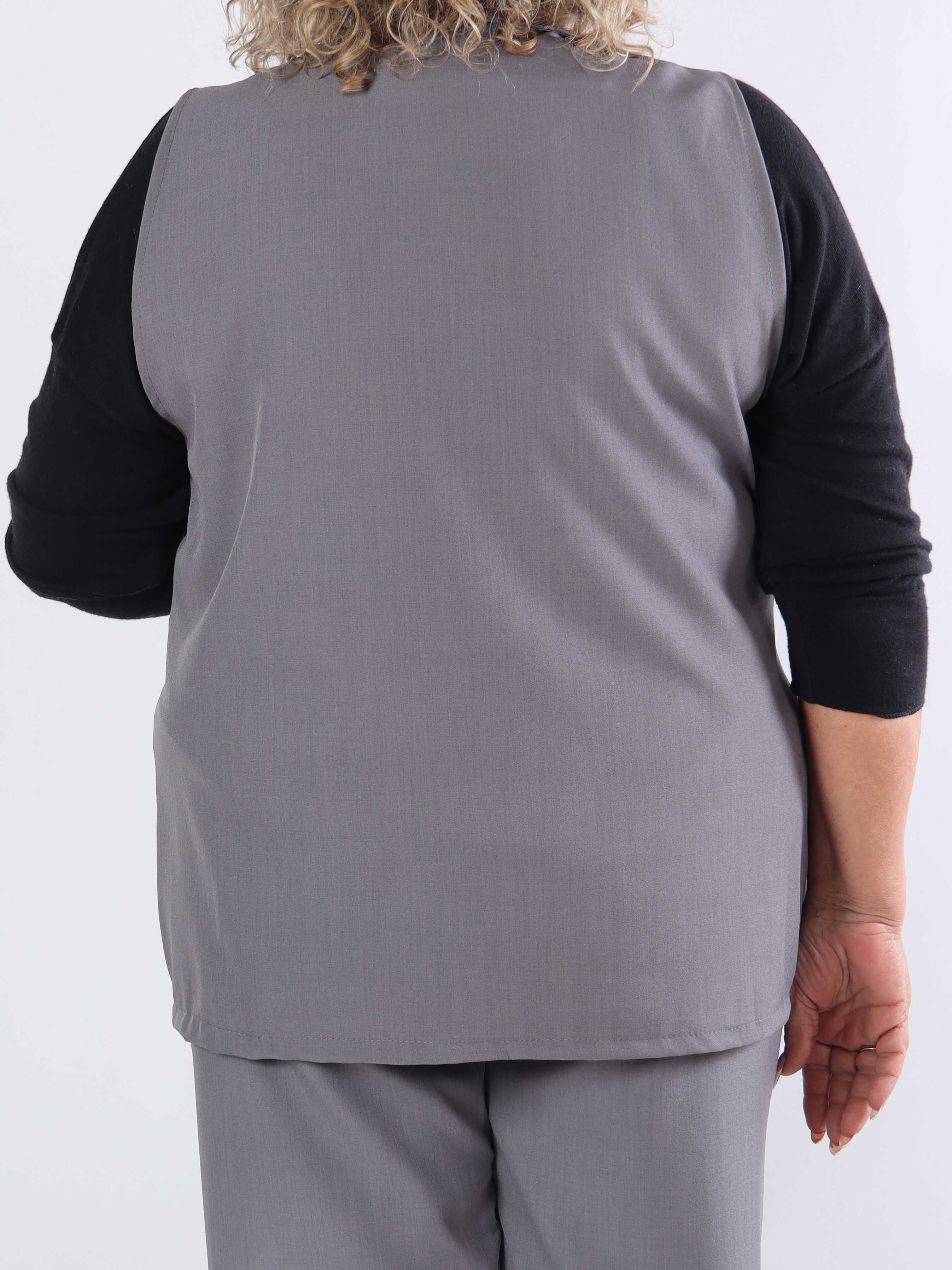 Shadia Vest - Enfärgad kostymväst med knapp och